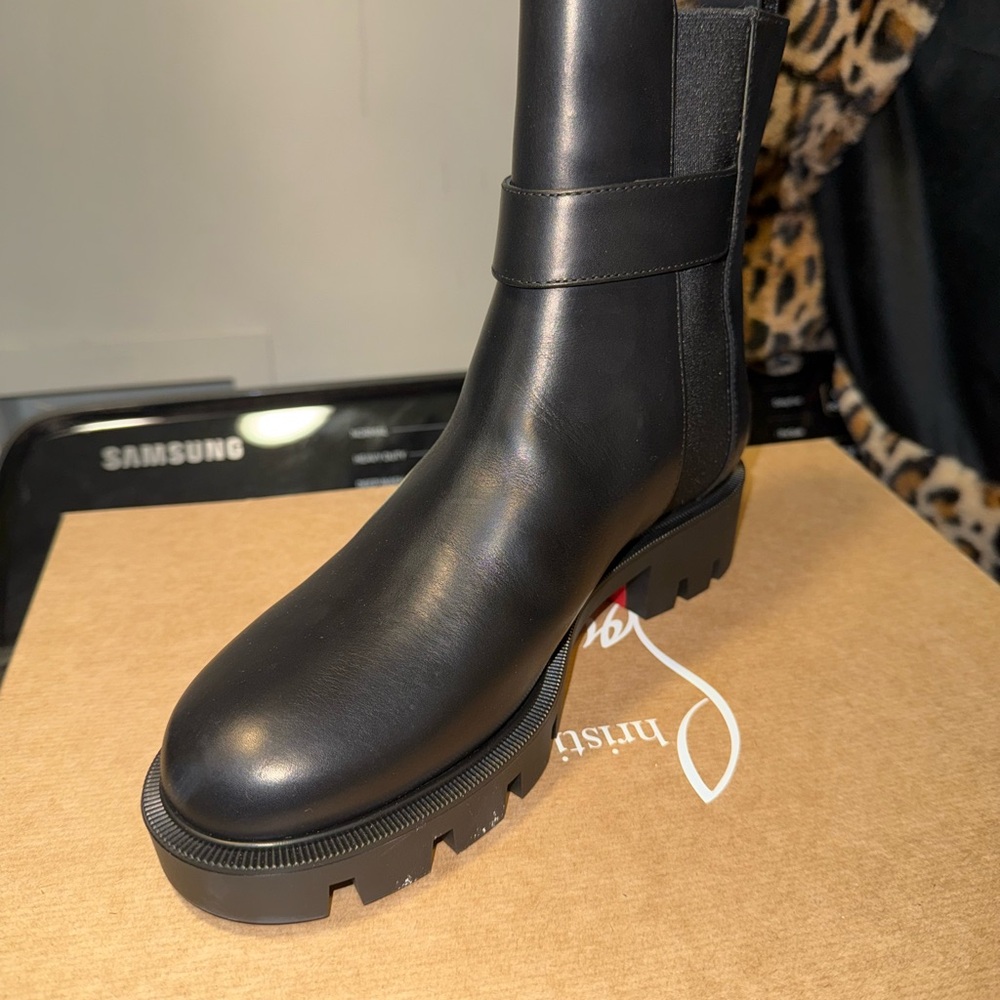 Christian Louboutin Black Combat Boots with Chunky Sole and Pull-On Style